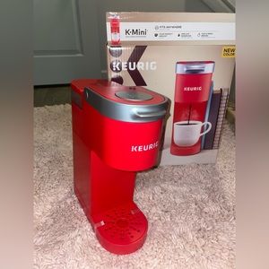 Poppy red K-mini Keurig. Never been used.